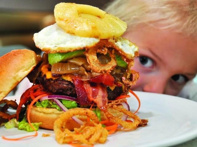 The Counter's famous burger hypnotizes a customer.